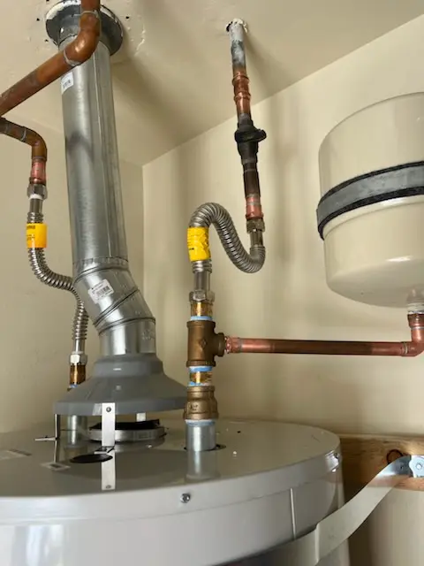 Water heater installation and plumbing repair in Navy